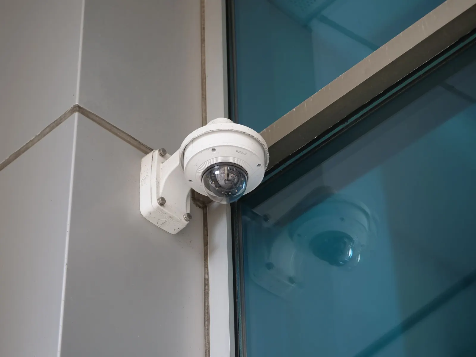Dome security camera on a building